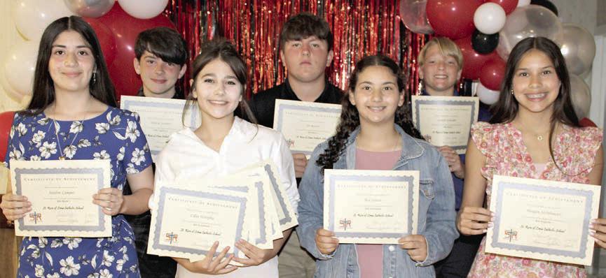 Top 8th Grade Students – (from left) Joseline Campos, math and Spanish; Demin Sommer, algebra and science; Lillia Wotipka, reading, English, social studies, yearbook and geography; Ian Reeves, band; Ava Slaton, religion, yearbook and geography; Joseph Schindler, band; and Morgan Steinhauser, English.