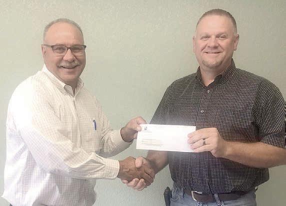 Fayetteville bank donates to fire dept.