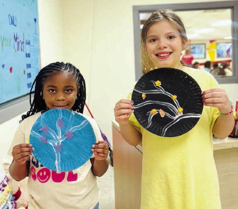 Since it’s the beginning of the spring session at the Schulenburg Unit of the Boys &amp;amp; Girls Club, staff conducted a lovely cherry blossom art project for kids to share with the public! Shown are Club members (from left) Legacy Crenshaw and Nevaeh Muras.