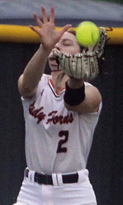 Fay Kutac makes a running catch in shallow left-centerfield against Shiner. Sticker Photo By Darrell Vyvjala