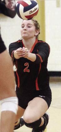 Madison Kunschick gets to a short serve in game three. Sticker Photo By Darrell Vyvjala