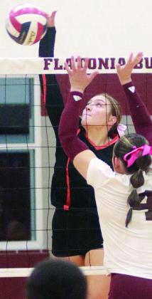 Greenli Van Zandt gets the final point in the Lady Horns’ third-set win in Flatonia. Sticker Photo By Darrell Vyvjala