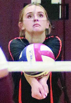 Miranda Bonner picks up a dig in game three last Tuesday. Sticker Photo By Darrell Vyvjala