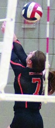 Landry Zapalac chases down a deflected Lady Bulldog attack in the third set. Sticker Photo By Darrell Vyvjala