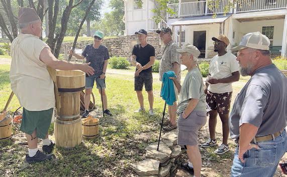 Living history interpreters bring festival-goers back to the time of the Bluff Schuetzenverein with craft and cooking demonstrations at the Kreische house.