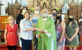 St. Anne’s Society celebrates feast, makes donations
