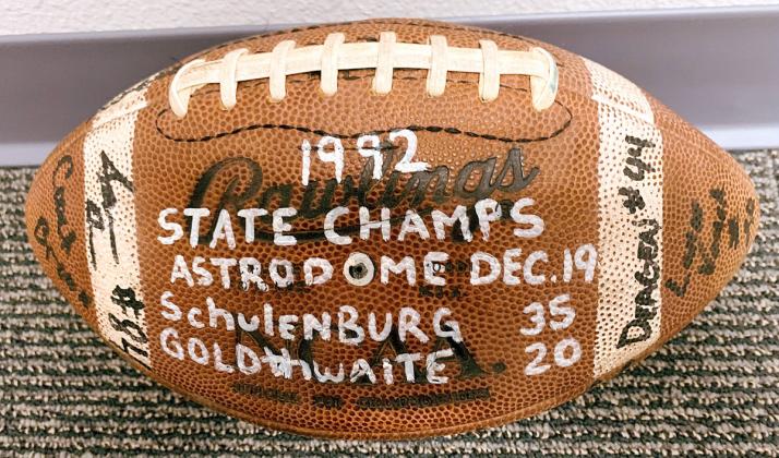 Autographed football (right) signed by members of the 1992 Shorthorn state championship football team.