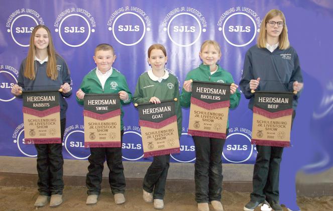 HERDSMAN AWARDS – From left: Mikayla Stang, rabbits; Abraham McBride, swine; Kylee Hoffmann, goat; Zoey Krenek, broilers; and Emma Kubala, beef. Winner kept their pens the cleanest throughout the show. Sticker Photo By Darrell Vyvjala