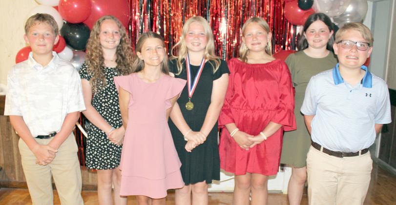 Winners in the St. Rose of LIma Catholic School science fair were (from left) William Herzik, Caroline Bartek, Clare Besetzny, Brynlee  Berger, Zoey Krenek, Charlotte Schmidt and Patrick Taylor.