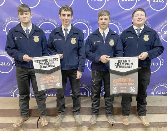 AG MECHANIC SHOW – (from left) Jackson Faith and Nathan Olsovsky, reserve champion (14-foot lowboy trailer); and Bryce Stoever and Ethan Steinhauser, along with (not shown) Jacob Vacek and Cade Ohnheiser, grand champion (24-foot lowboy gooseneck trailer). Sticker Photo By Darrell Vyvjala