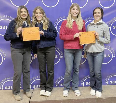 FLORAL CUP – (from left) Klare Segura and Landry Deagen, second place; and Chayse Deagen and Makena Kopecky, first place. Students in Advanced Floral Design 1 and 2 competed. Winners were determined by votes cast on Thursday and Friday during the livestock show. Sticker Photo By Darrell Vyvjala