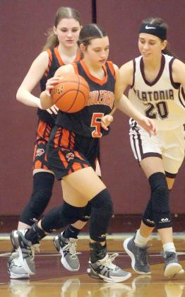 Fay Kutac comes away with a steal  in the third quarter last week. Sticker Photo By Darrell Vyvjala