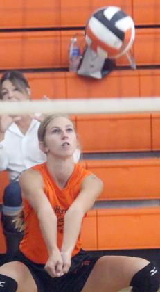 Clara Magliolo sends a pass on its way during the scrimmage against Hallettsville. Sticker Photo By Darrell Vyvjala