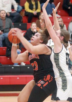 Arianna Vincent draws a foul on a move to the basket in the second half. Sticker Photo By Darrell Vyvjala