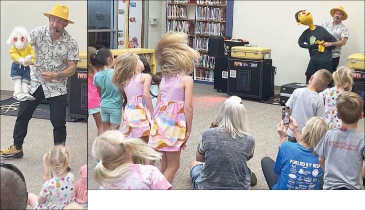 Puppeteer Mr. Leo and his cool goat (left) interact with youngsters after the children enjoyed a song and dance with him and his buddy, “Tommy” (above). The show last Friday morning was the first of the local public library’s Summer Reading Program that continues through late July. Sticker Photos By Darrell Vyvjala