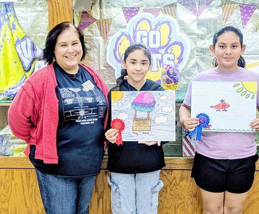 WeimaR eLememTaRy winners: Kimberly Garcia (right), first place; and Dayanna Martinez  (center), runner-up. Representing  Stanzel Model Aircraft Museum is  director Cynthia Fogleman (left).