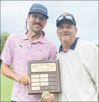 PUTTING CONTEST From left: Justin Rosenauer, first place; and Jimmy Heger, second place. Sticker Photo By Darrell Vyvjala
