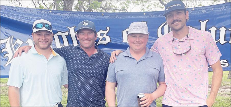 2ND FLIGHT: 1st Place – 13 under par (59) From left: Carter Helmcamp, Greyson Ulrich, Austin Purdy, and Justin Rosenauer. Sticker Photo By Darrell Vyvjala