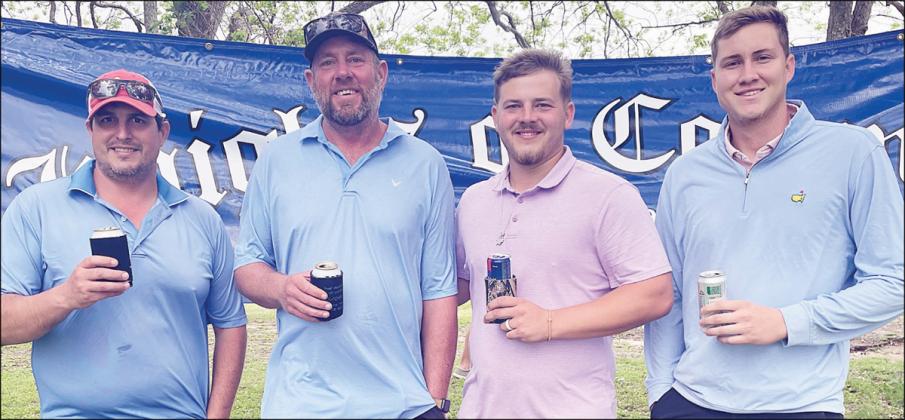 2ND FLIGHT: 2nd Place – 9 under par (63) From left: Jake Michael, Cory Holiday, Jacob Brandt, and Justin Rogers. Sticker Photo By Darrell Vyvjala