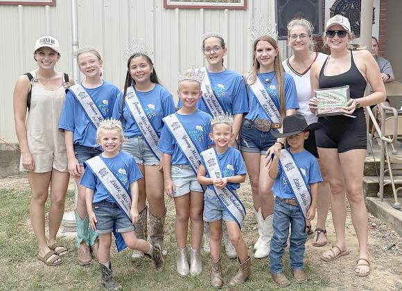 Local Chili 1st Place – “Barefoot Cookers,” represented by Krystana Stavinoha Henson (left), Charlet Sedlar  (back, second from left), and Kaylyne Harp (right). Also shown is Miss Schulenburg and her court. 2nd Place – “Mars BBQ” – Eddie Faith. 3rd Place – “Velvet Bordello” – Chancy Horn. Sticker Photo By Layne Vyvjala