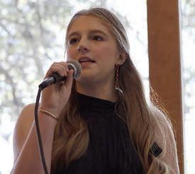 Reagan Moreau speaks on behalf of her father, Craig, at the forum. Photo By Melanie Berger / Courtesy of Flatonia Argus