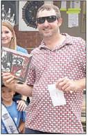 1ST PLACE BRISKET – “Texas Smoke Authority” of Paige, represented by Chad Eckert. Sticker Photo By Layne Vyvjala