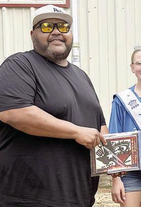 1ST PLACE RIBS – “Flying G Barbecue” of Kingsbury, represented by Ira Green. Sticker Photo By Layne Vyvjala