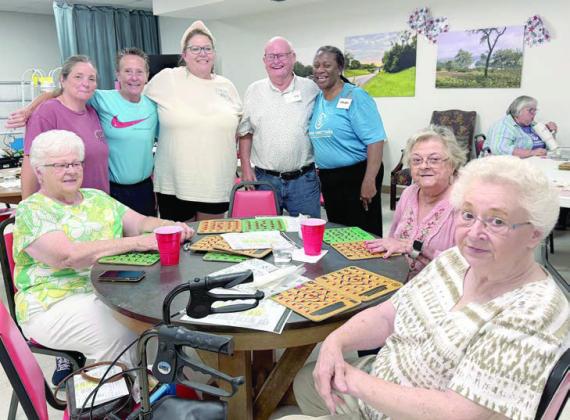 The crew from Schulenburg Family Fitness Center had everyone smiling when they came to call bingo recently. Shown are (from left) Gloria Miksch, Jennifer Dial, Kim Brown, Deanie Crim, Johnny Fojtik, Darlene Williams, Ginni Berwick and Helen Ohnheiser.