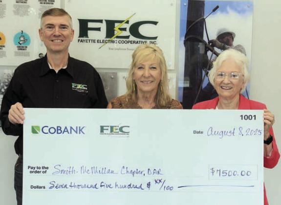 Smith-McMillan Chapter, Daughters of the American Revolution (DAR), received a $7,500 grant from FEC and CoBank. Shown are (from left) FEC General Manager/CEO Doug Lambert, Smith-McMillan Chapter treasurer Jacquelyn Head and Smith-McMillan Chapter regent Carolyn Caflisch.