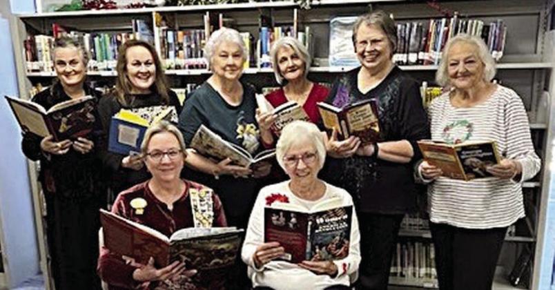 Donation to Flato nia Publ ic Library – (front row, from left) Kim Joost, Smith-McMillan Chapter librarian; Carolyn Caflisch, Smith-McMillan Chapter regent; (back row) Juli McCroskey, DAR member; Lori Schultz, DAR member; Glenda Mach, Flatonia Public Library; Barbara Rogers, Flatonia Public Library; Carolyn West, Flatonia Public Library; and LaVerne Dornak, Flatonia Public Library director.