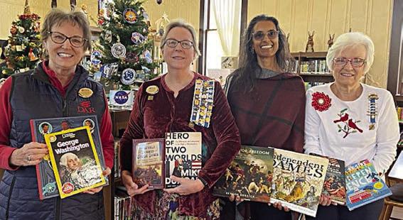Donation to Rou nd Top Fam ily Library – (from left) Kathy Schatte, DAR member; Kim Joost, Smith-McMillan Chapter librarian; Keelia Ritch, Round Top Family Library manager; and Carolyn Caflisch, Smith-McMillan Chapter regent.