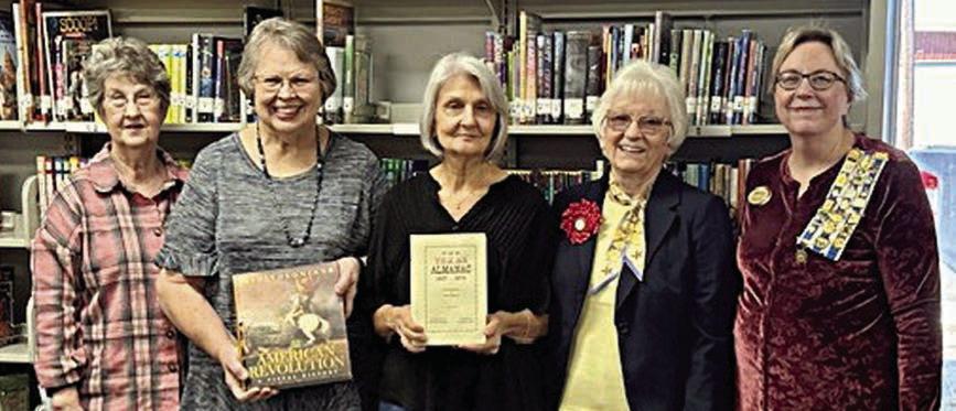 Presentation at Flatonia Public Library – Judy Syler, Flatonia Public Library; Carolyn West, Flatonia Public Library board member; Barbara Rogers, Flatonia Public Library board member; Carolyn Caflisch, Smith-McMillan Chapter regent; and Kim Joost, Smith-McMillan Chapter librarian.