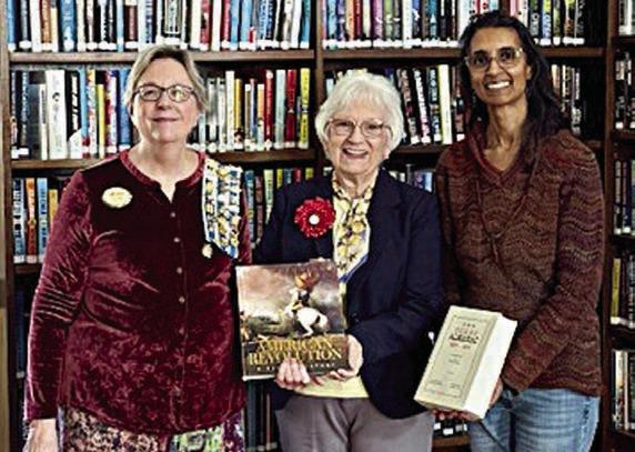 Presentation at Round Top Family Library – (from left) Kim Joost, Smith-McMillan Chapter librarian; Carolyn Caflisch, Smith-McMillan Chapter regent; and Keelia Ritch, Round Top Family Library manager.