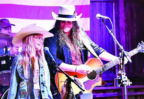 Briana Adams (right) was joined by Marley Vasek (left) for a performance at Holman Valley Steakhouse that raised funds for three animal welfare organizations in the area. Adams is a singer/songwriter who grew up in Winchester and has been touring all over Texas for the past 12 years.
