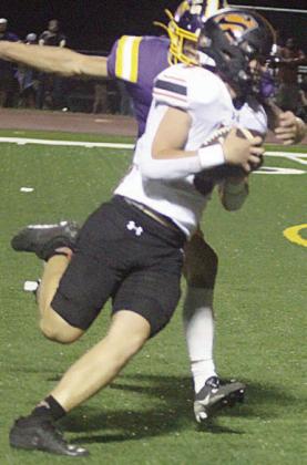 Owen Brenek turns upfield after a reception in the third quarter for a 15-yard gain. Sticker Photo By Darrell Vyvjala