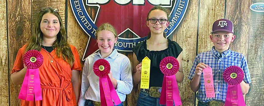 Reserve Champion Intermediate Team – (from left) Addison Eichler, Julia Melton, Tatum Fritsch and Holden Holub. Holub belongs to the Schulenburg 4-H.