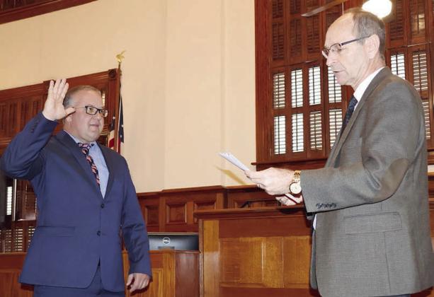 Swearing in for new county atty.