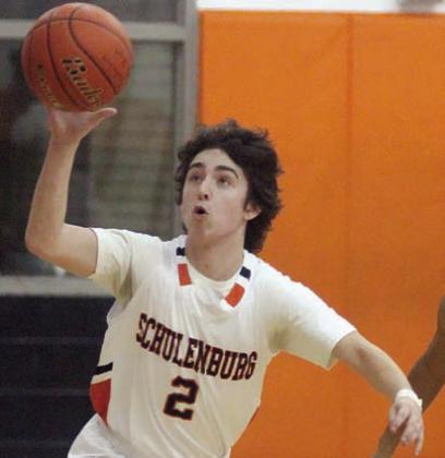 Graylen Adams comes up with a steal in the fourth quarter on Dec. 19. Sticker Photo By Darrell Vyvjala