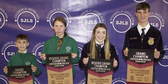 PROFICIENCY TEST – From left: Crockett Guenther, junior division grand champion; Hope Hammack, junior division reserve champion; Keaton Walker, senior division reserve champion; and Grant Kubala, senior division grand champion. Winner scored the best on a 15-question test over general livestock knowledge. Sticker Photo By Darrell Vyvjala