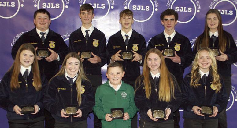 SHOWMANSHIP GRAND CHAMPIONS Front, from left: Landry Zapalac, dairy; Keaton Walker, sheep; Abraham McBride, swine; Harly Zapalac, breeding doe; and Keely Warnken, breeding beef. Back, from left: Ethan Steinhauser, broilers; Grant Kubala, steer; Van Prihoda, goat; Nathan Olsovsky, rabbits; Madyson Holub, breeding swine. Sticker Photo By Darrell Vyvjala