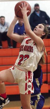 Miranda Bonner goes up for a fast-break layup in the first half of Friday’s win over Louise. Her 19 points helped the Lady Horns rebound from a blowout loss in Flatonia earlier last week. For more, see Page 4. Sticker Photo By Darrell Vyvjala
