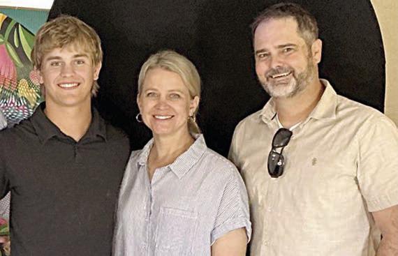 Emerson Harvey (left), scholarship winner, along with his mother Katie Harvey (center) and his father Barrett Harvey (right).