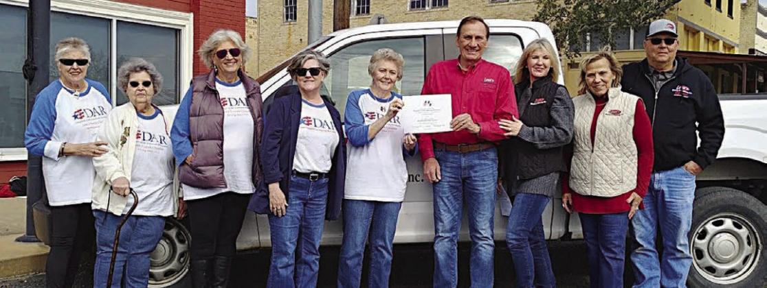 DAR recognizes leon's Electric &amp; Plumbing for flag display