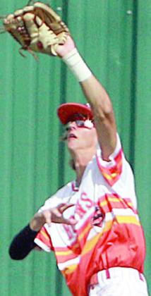 Connor Lichnovsky tracks down a fly ball in left field last Thursday. Sticker Photo By Darrell Vyvjala
