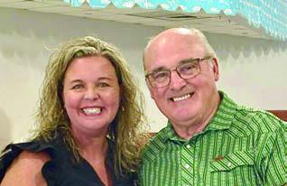 Elementary principal Callene Zapalac and First Baptist Church Pastor David Thompson.