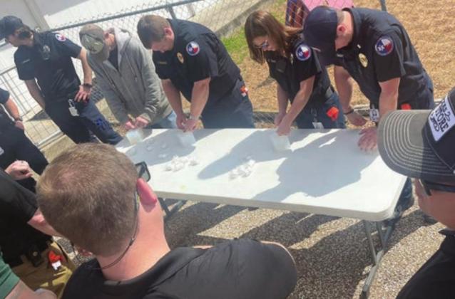 Responders use combat gauze to pack wounds of various sizes. Both law enforcement officers and EMS are trained on lifesaving techniques in addition to applying tourniquets to their own arms and legs if injured. The goal is to have the tourniquet fully in place in under 20 seconds.