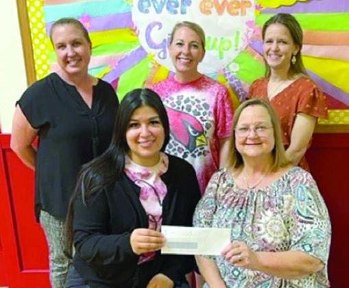 Presentation at St. Rose Sc hool – (front row, from left) Melanie Ramirez-representing Stanzel Family Foundation, Rosanne Gallia, (back row) Jamie Rainosek, Kacy McBride and Cheryl Pekar-representing Stanzel Family Foundation.