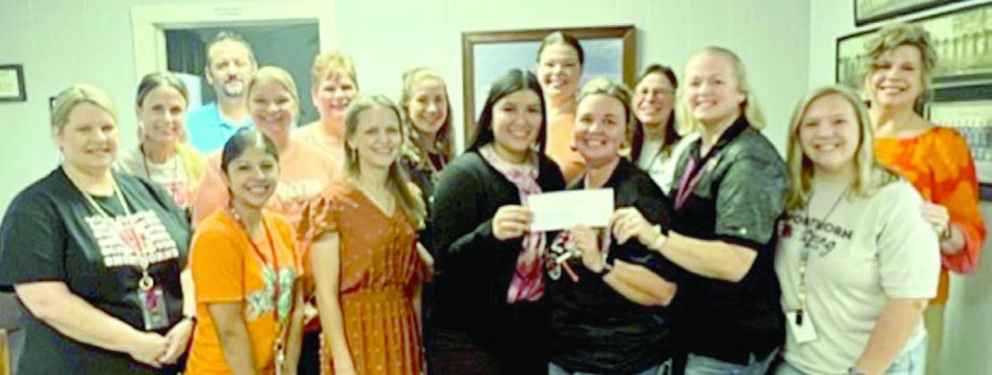 Presentation at Sc hulenburg Elementary, schulenburg Junior High and schulenburg High Sc hool – (front row, from left) Amy Thibodeaux, Cristina Moreno, Cheryl Pekar-representing Stanzel Family Foundation, Melanie Ramirez-representing Stanzel Family Foundation, Callene Zapalac, Kristi McBride, Kacy Svatek, (back row) Jamie Lusk, Lee Hartsell, Heather Pavlu, Donna Janda, Kayla Willey, Kristin Holub, Michelle Hammack, Dr. Julie Motomura and (not shown) Perla Barrera and Carol Hargadine.