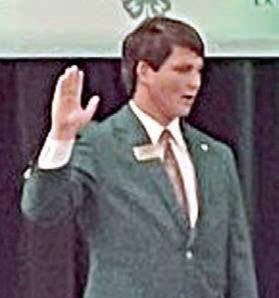 Being sworn in as Speaker of the House is Cooper Mau.