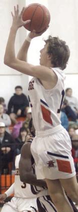 Van Prihoda hits a short jump shot in the second quarter on Jan. 12. Sticker Photo By Darrell Vyvjala